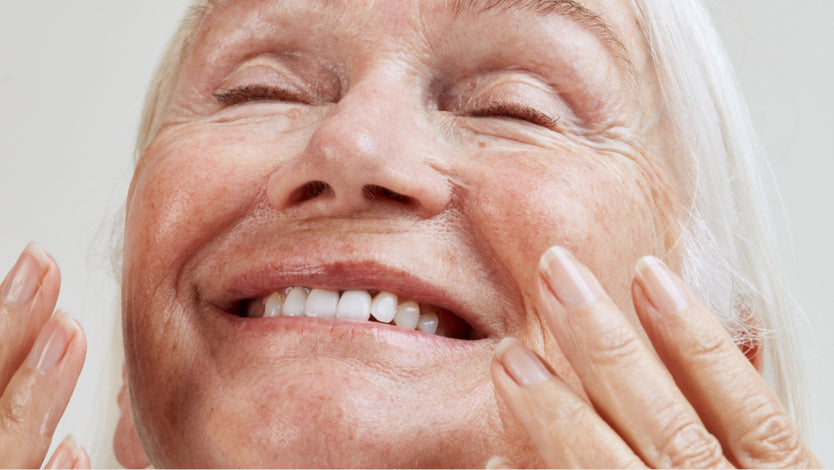 Woman using Peptides skincare product