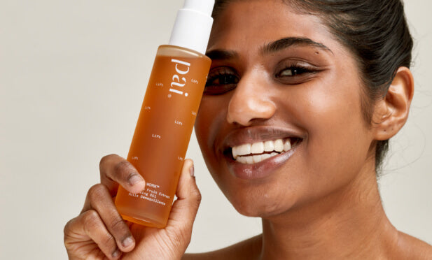 woman holding pai light work cleanser